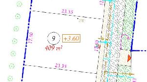 Terrain construtible de 409m2 proche des commerces.